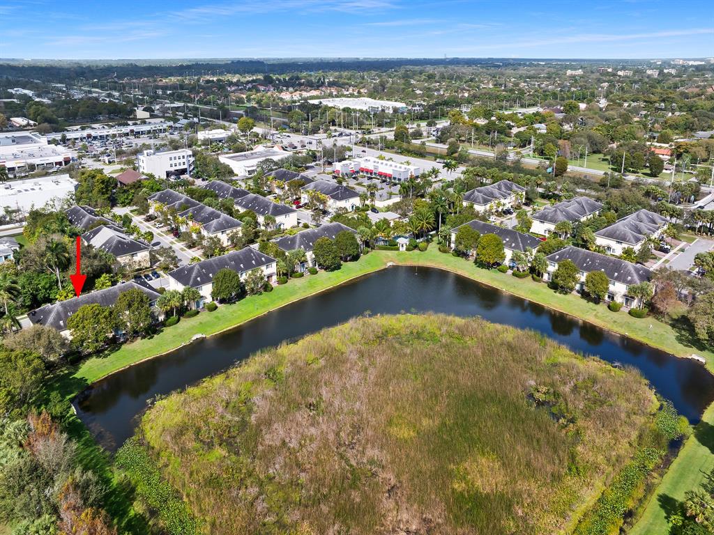 4792 Sundance Way, Unit 4792 Davie, FL 33328 - Photo 30 of 33 an aerial view of a house with a lake view