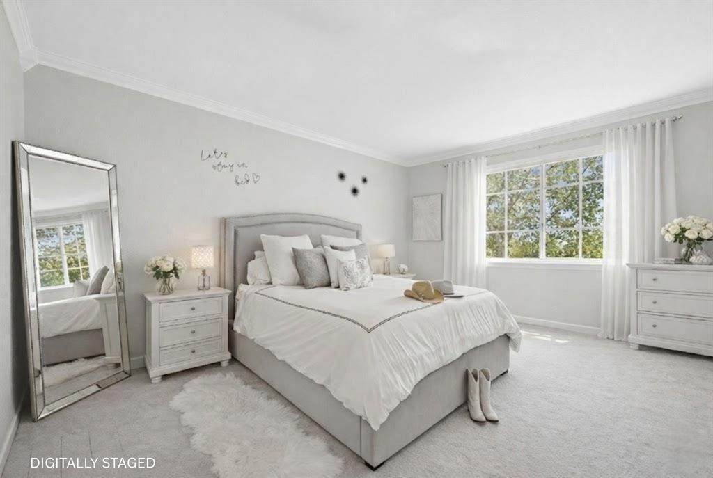 4792 Sundance Way, Unit 4792 Davie, FL 33328 - Photo 3 of 33 a bedroom with a large bed and a window