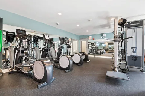 a view of a room with gym equipment