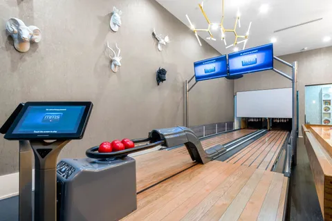 a room with furniture and a flat screen tv