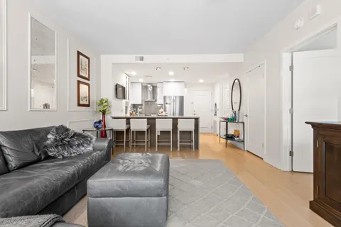 a living room with furniture and a table