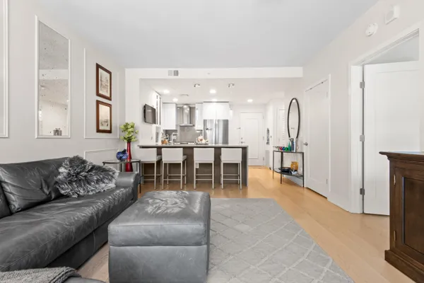 a living room with furniture and a table