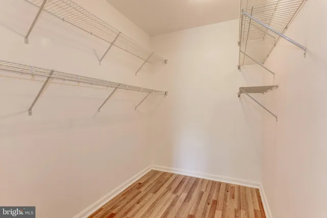 a view of a room with racks on the wall