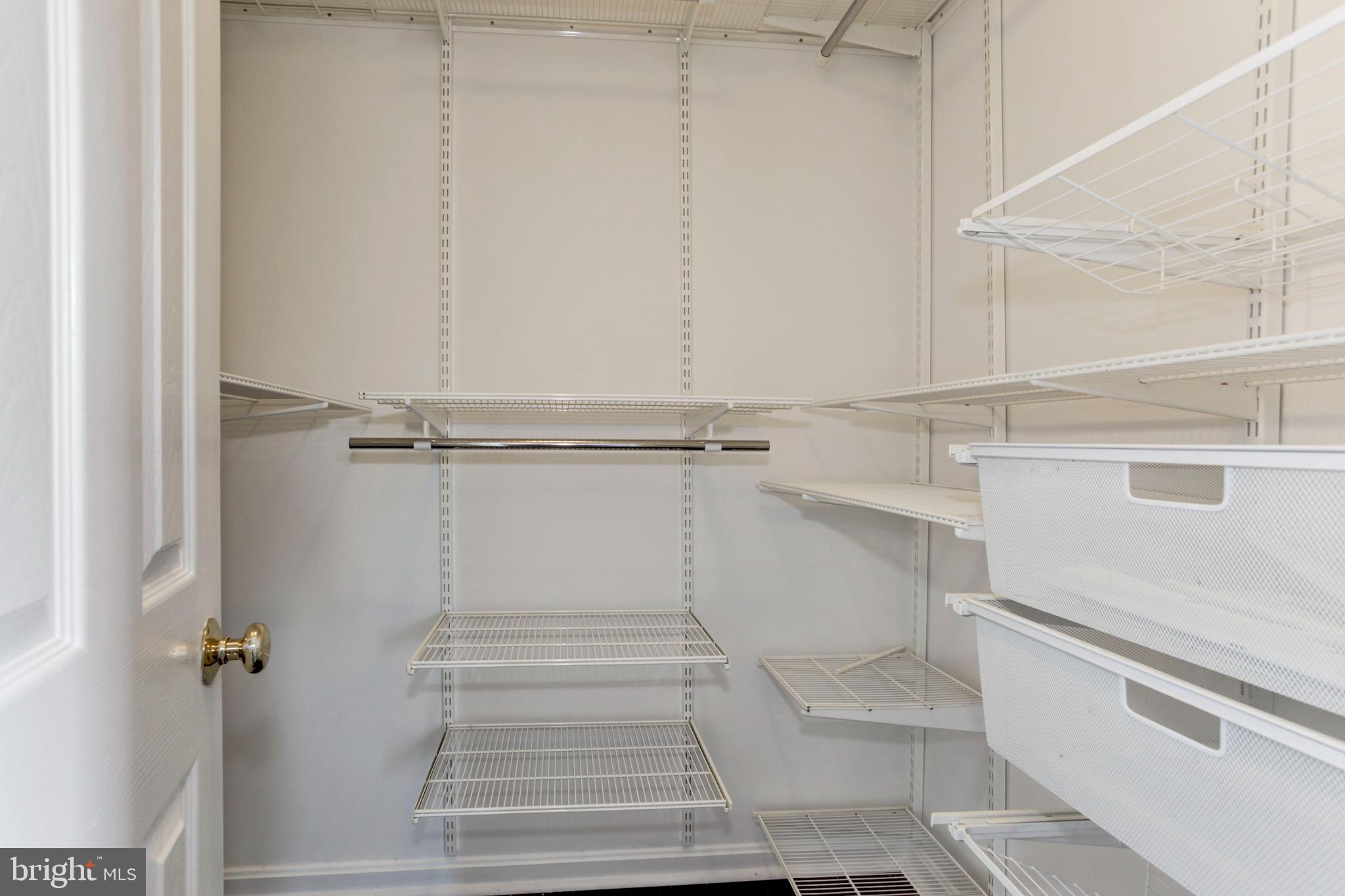 21012 Timber Ridge Terrace, Unit 201 Ashburn, VA 20147 - Photo 34 of 37 a view of walk in closet