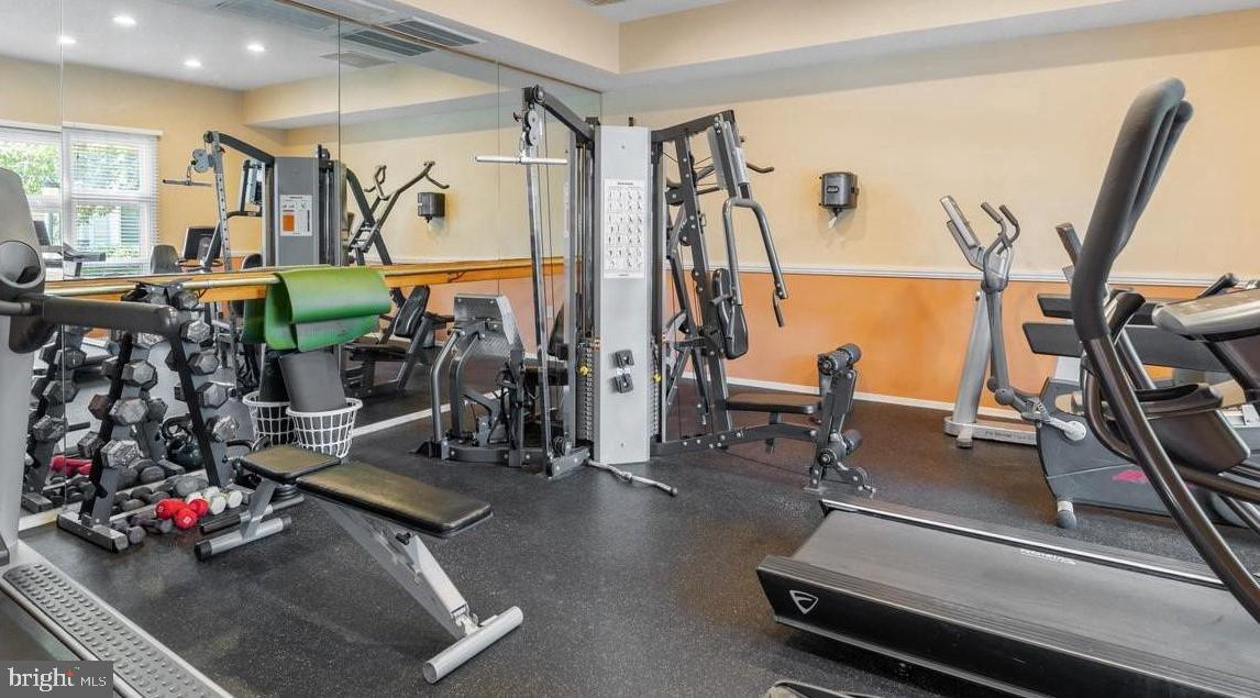 21012 Timber Ridge Terrace, Unit 201 Ashburn, VA 20147 - Photo 36 of 37 a view of a room with gym equipment