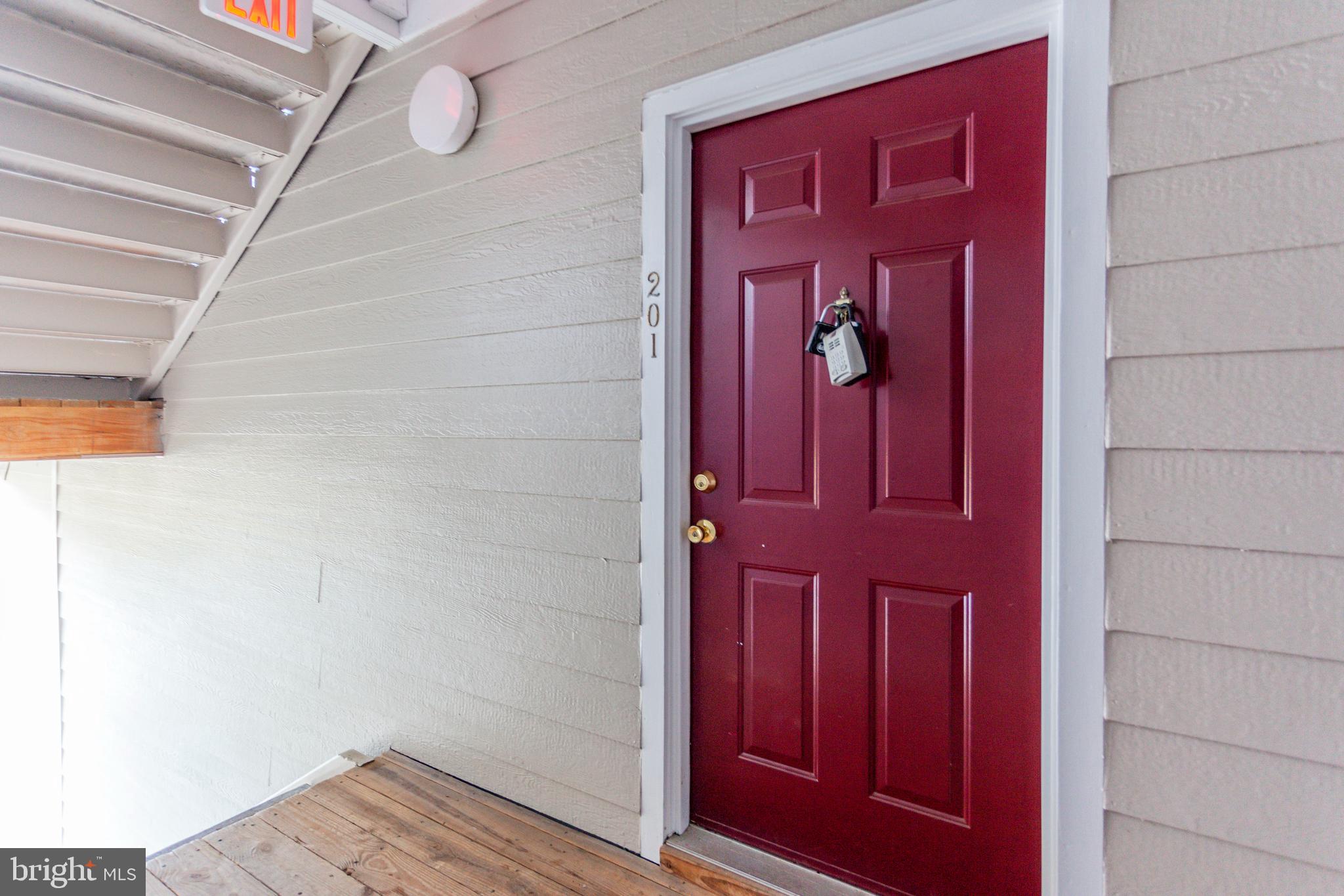 21012 Timber Ridge Terrace, Unit 201 Ashburn, VA 20147 - Photo 4 of 37 a view of front door