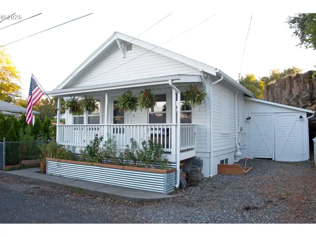 a house view with a garden space