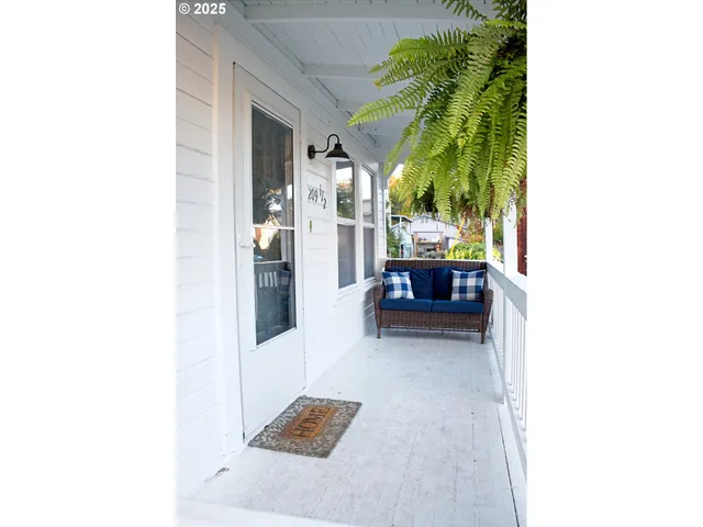a view of a living room with a rug
