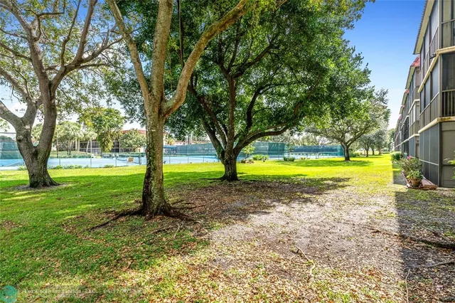 a view of a golf course with a lake