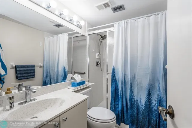 a bedroom with a bed and a table in it