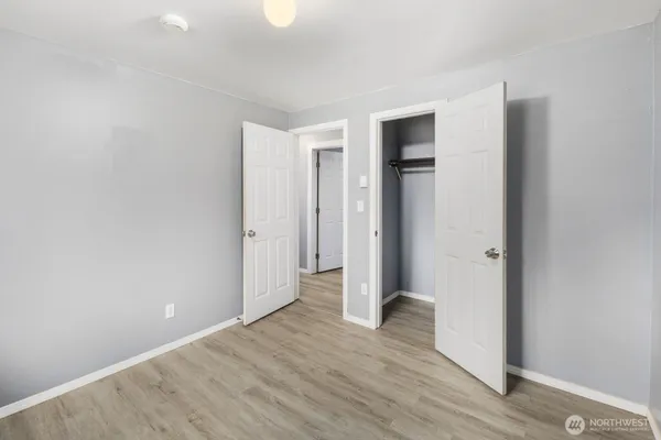 a view of wooden floor in an empty room