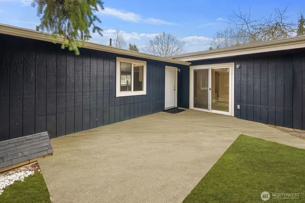 a view of a backyard of a house