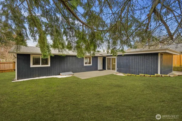 a backyard of a house with lots of green space