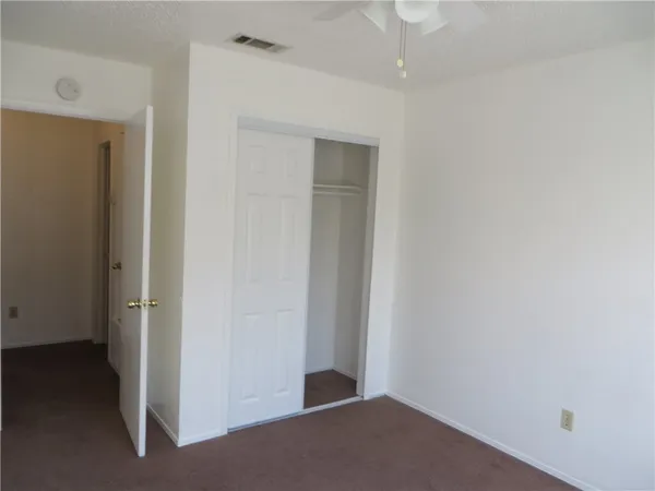 a view of hallway with closet
