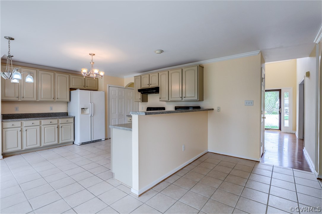 9601 Dunroming Road Chesterfield, VA 23832 - Photo 16 of 34 a kitchen with white cabinets and refrigerator