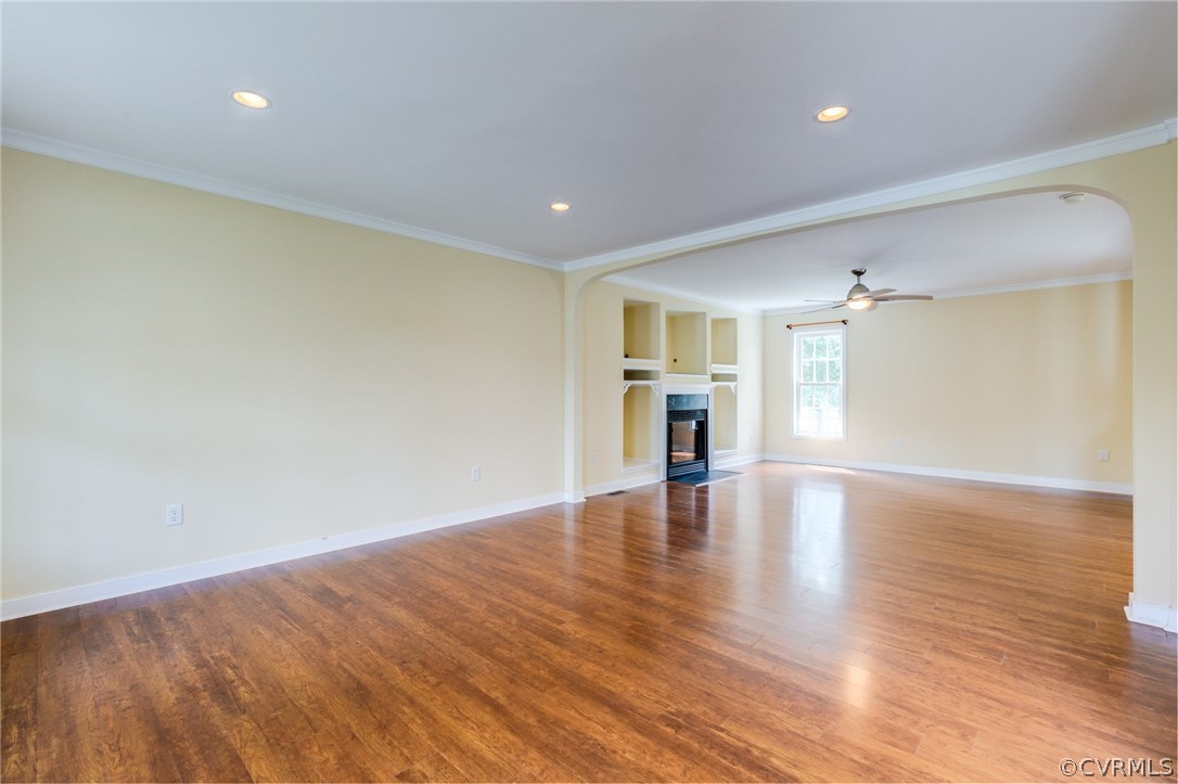 9601 Dunroming Road Chesterfield, VA 23832 - Photo 10 of 34 a view of an empty room with wooden floor and a window