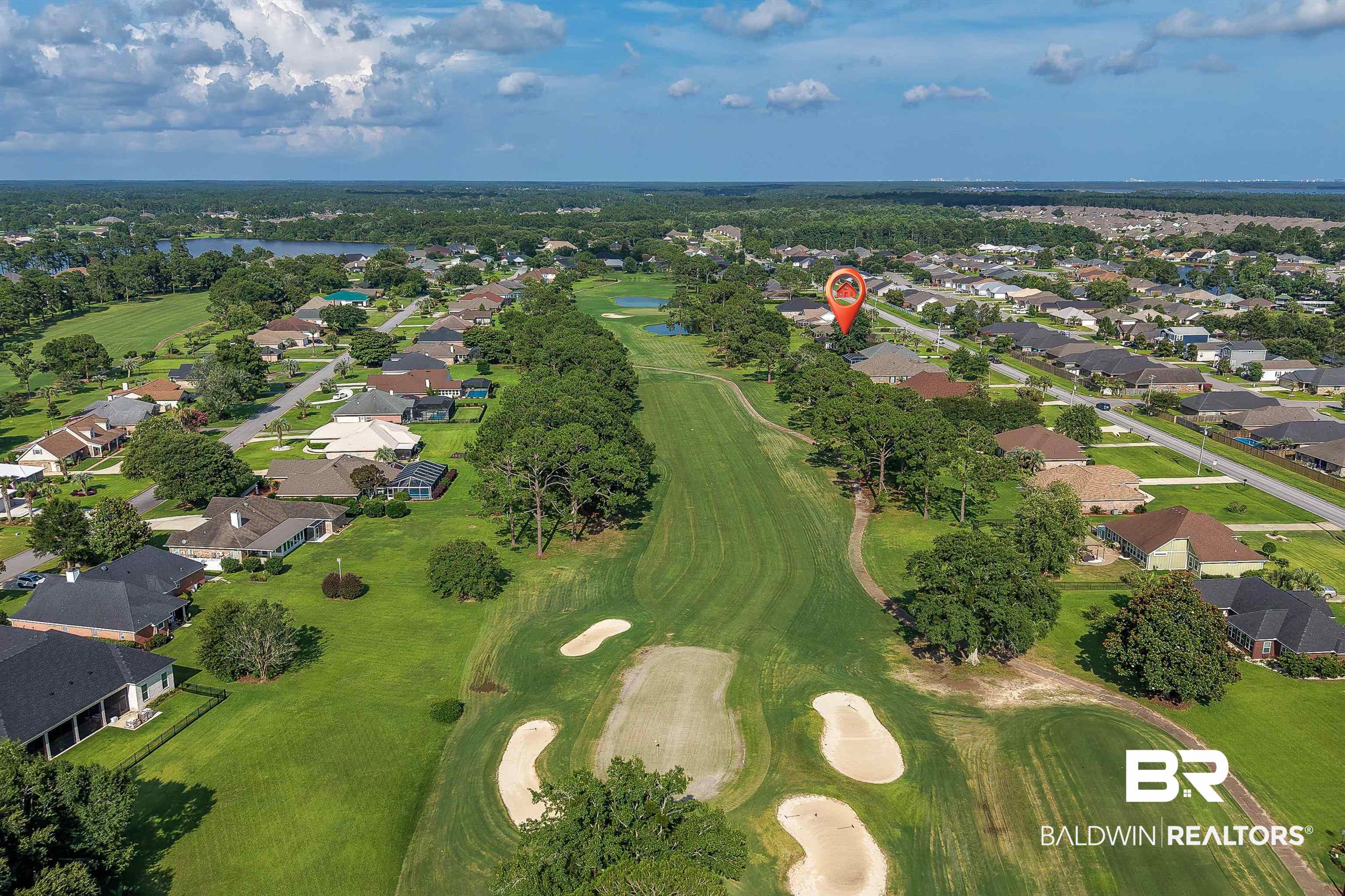 22685 County Road 12 Foley, AL 36535 - Photo 82 of 89 Aerial perspective showcasing a residential community bordering a golf course with multiple sand traps and water features