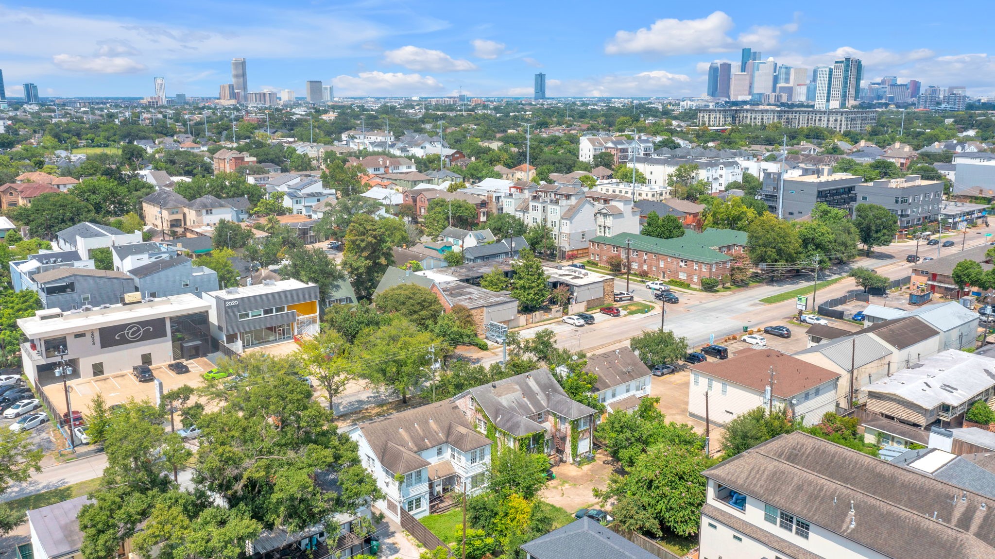 1947 Richmond Avenue, Unit B Houston, TX 77098 - Photo 11 of 12 an aerial view of a city with lots of residential buildings