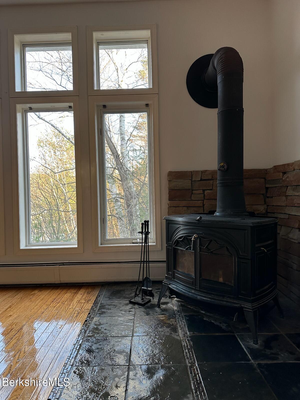 4 Olson Road Florida, MA 01247 - Photo 14 of 29 a living room with furniture and a fireplace