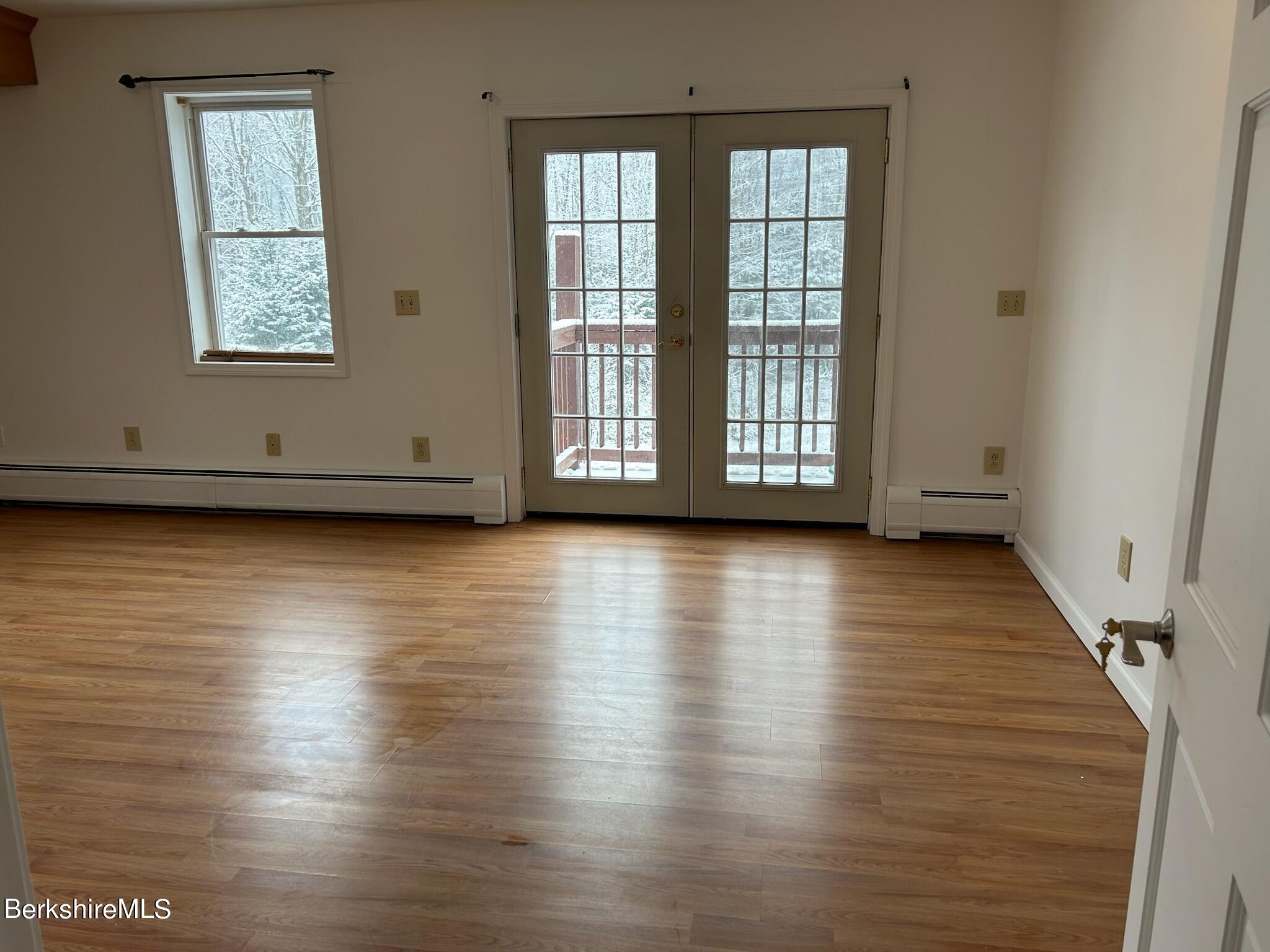4 Olson Road Florida, MA 01247 - Photo 16 of 29 a view of a room with wooden floor and window