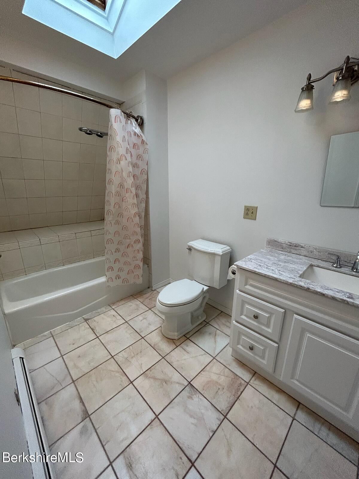 4 Olson Road Florida, MA 01247 - Photo 21 of 29 a bathroom with a granite countertop sink a toilet and shower
