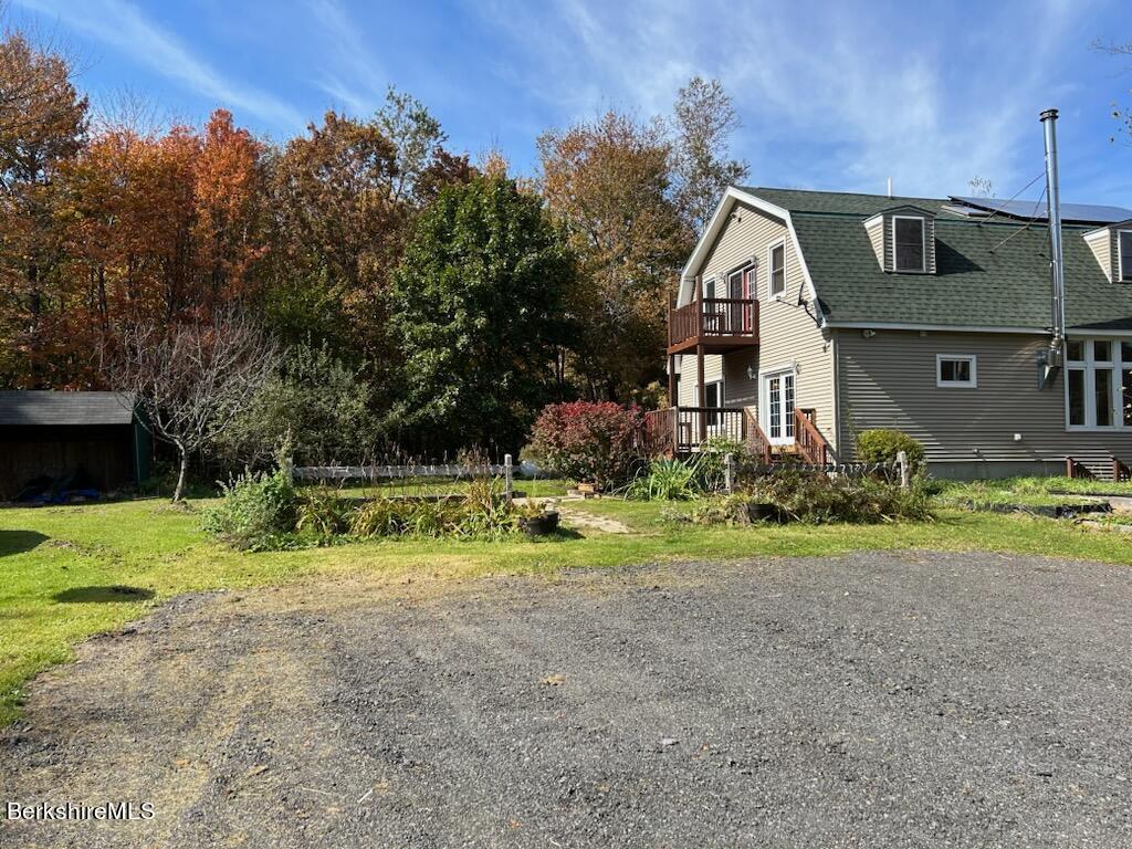 4 Olson Road Florida, MA 01247 - Photo 3 of 29 a front view of house with yard and trees
