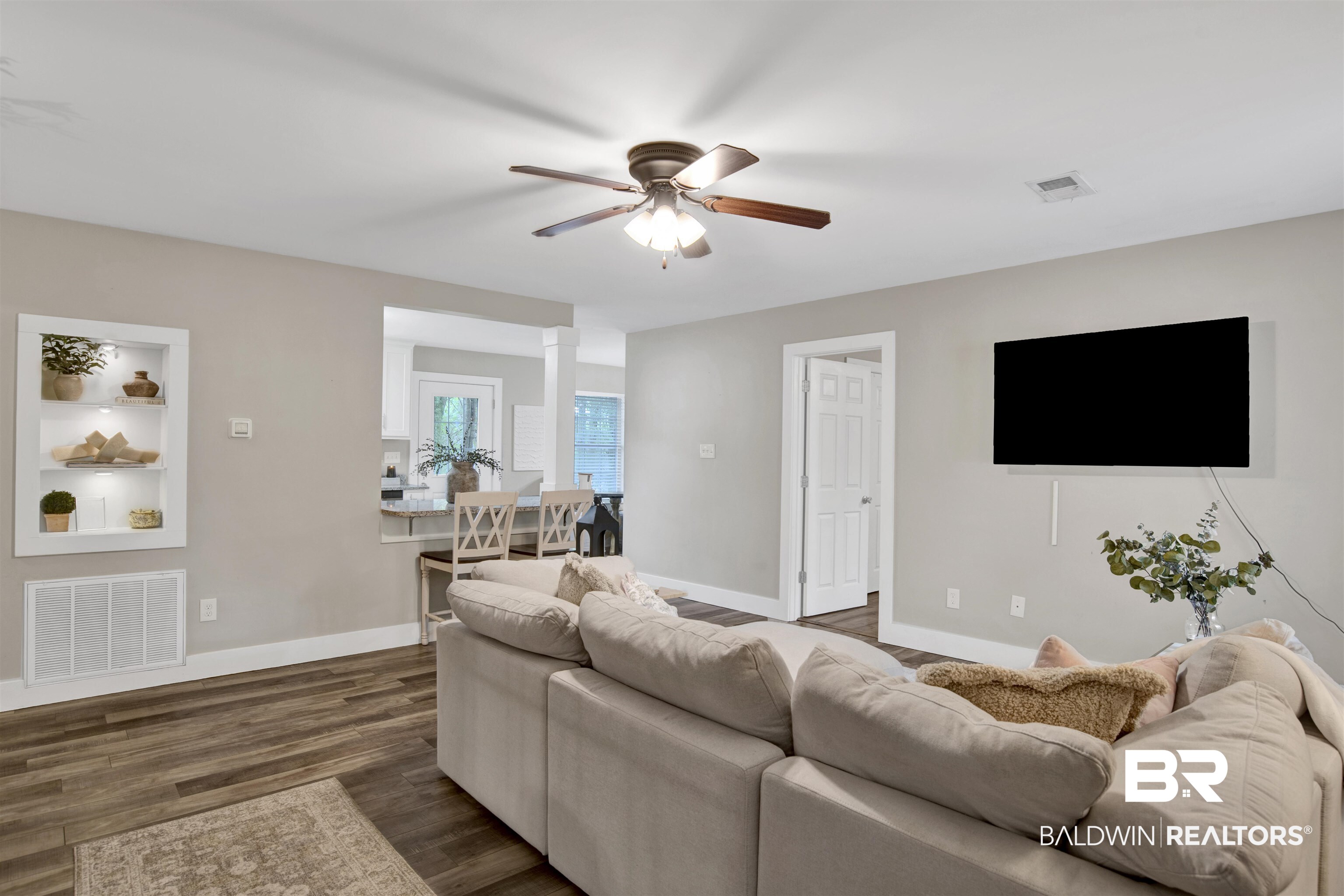 253 Maplewood Loop Daphne, AL 36526 - Photo 16 of 30 Living area featuring wood-finish flooring, recessed lighting, and a ceiling fan