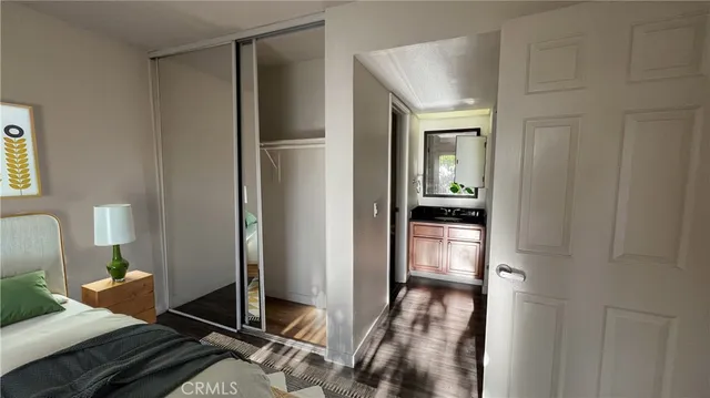 a living room with a bed and furniture