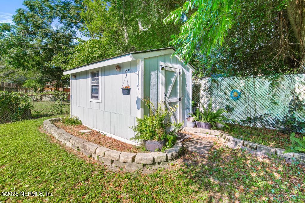1810 Griflet Road Jacksonville, FL 32211 - Photo 27 of 42 a view of a back yard of the house