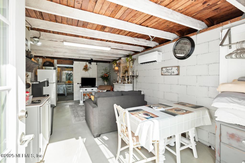 1810 Griflet Road Jacksonville, FL 32211 - Photo 32 of 42 a dinning table and chairs in a room