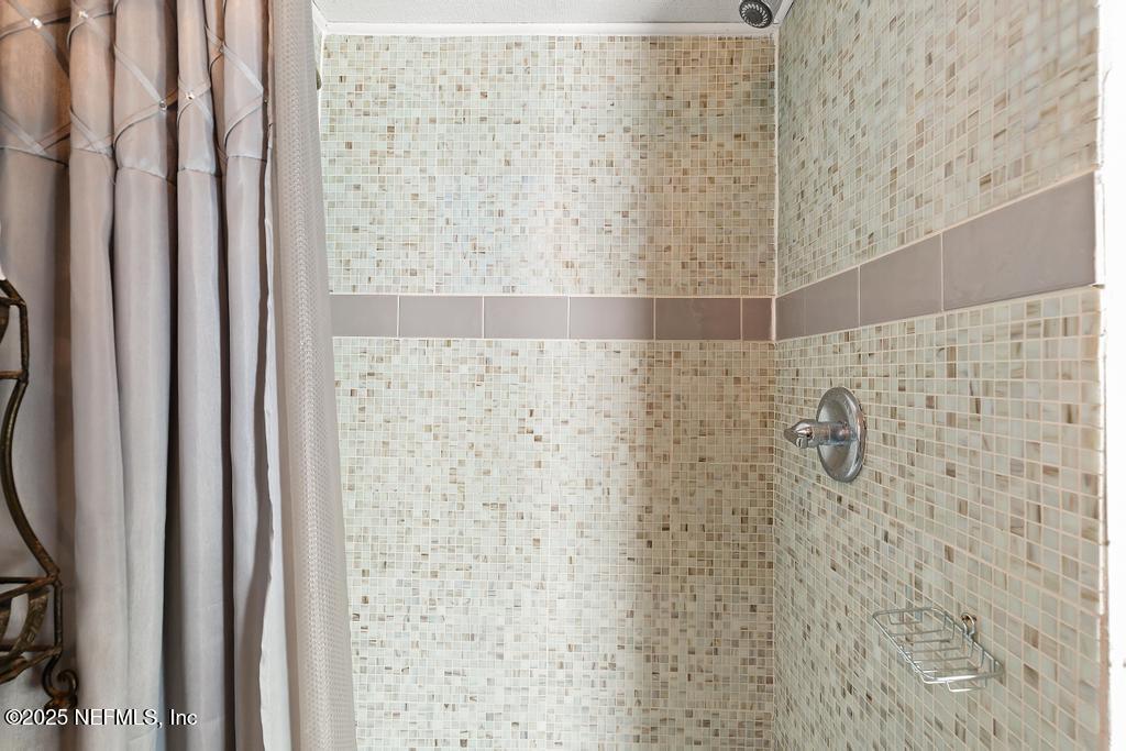 1810 Griflet Road Jacksonville, FL 32211 - Photo 35 of 42 a bathroom with a shower