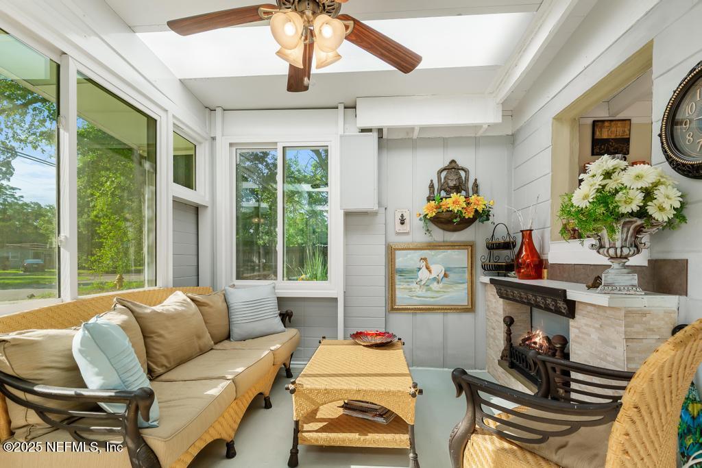 1810 Griflet Road Jacksonville, FL 32211 - Photo 6 of 42 a living room with furniture and a large window