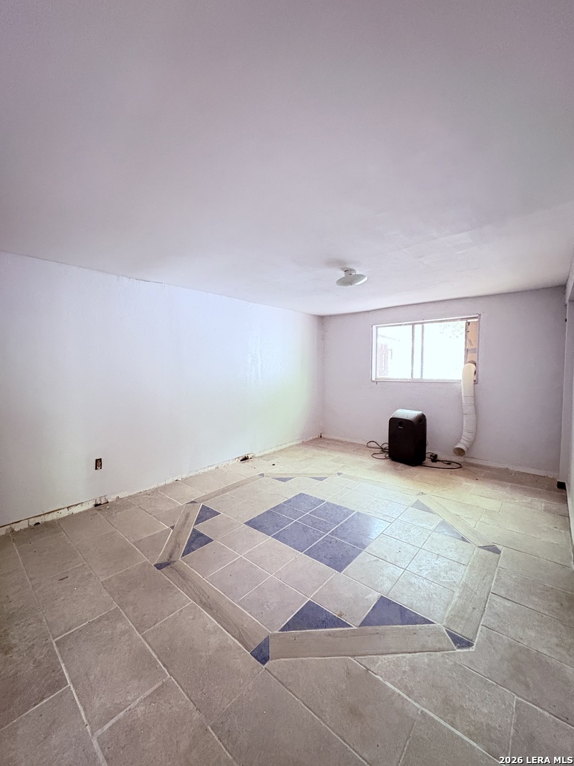 3233 Yucca Loop Eagle Pass, TX 78852 - Photo 2 of 11 a view of empty room with windows