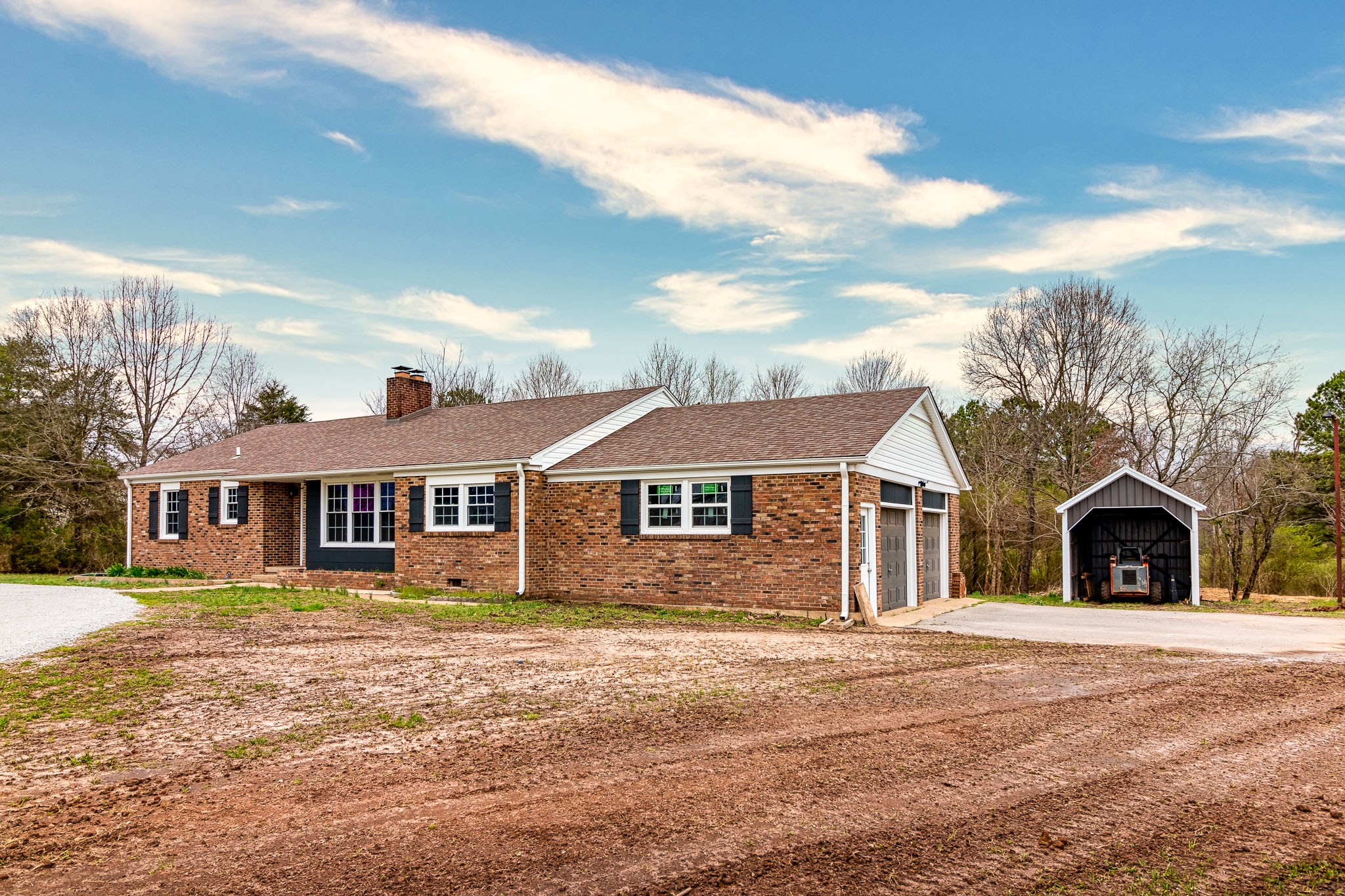 1031 Marable Road Lawrenceburg, TN 38464 - Photo 3 of 27 a front view of a house with a yard