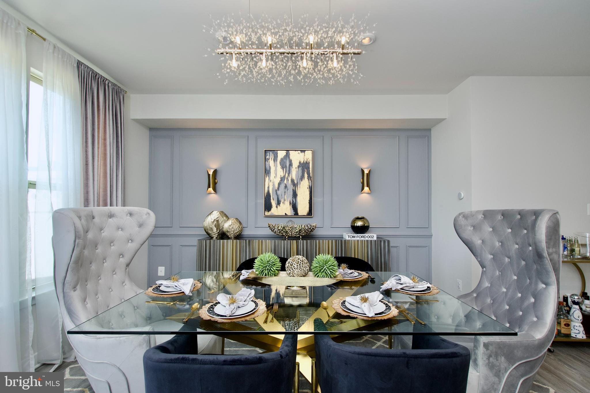 10810 Norbourne Farm Road Upper Marlboro, MD 20772 - Photo 13 of 38 a living room with furniture and chandelier