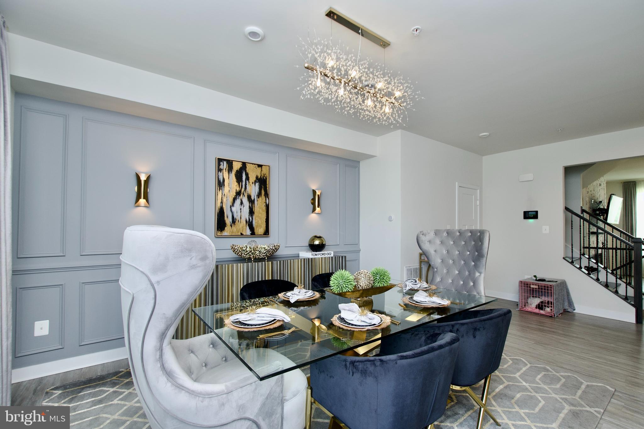 10810 Norbourne Farm Road Upper Marlboro, MD 20772 - Photo 14 of 38 a living room with furniture and a chandelier