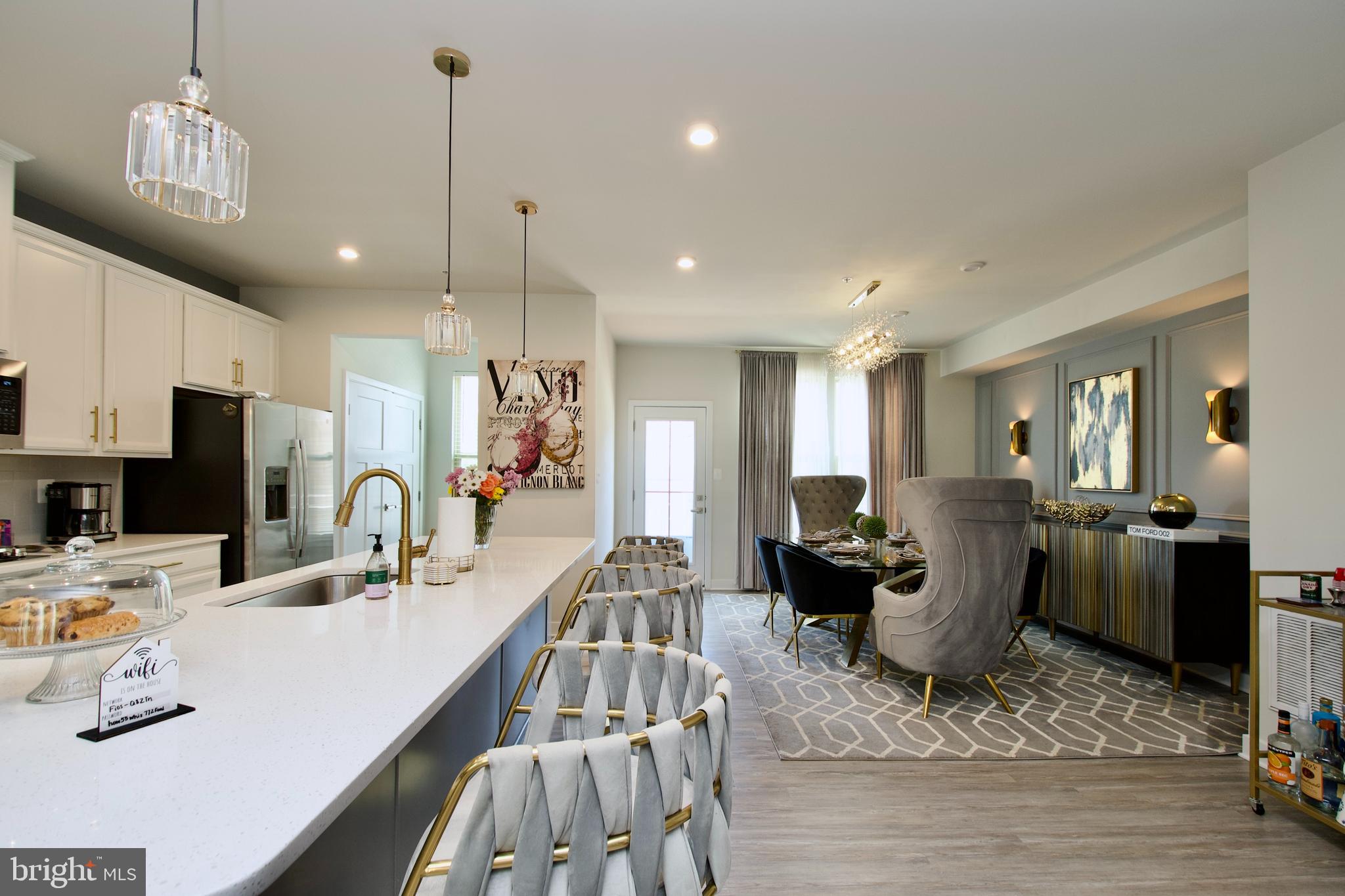 10810 Norbourne Farm Road Upper Marlboro, MD 20772 - Photo 15 of 38 a dining room with furniture and wooden floor