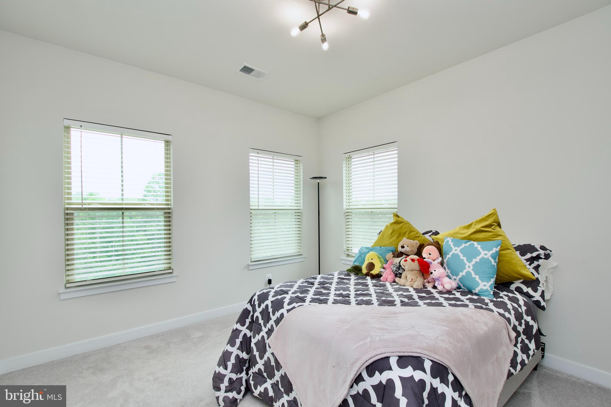 10810 Norbourne Farm Road Upper Marlboro, MD 20772 - Photo 21 of 38 a bed room with a bed and a two bed