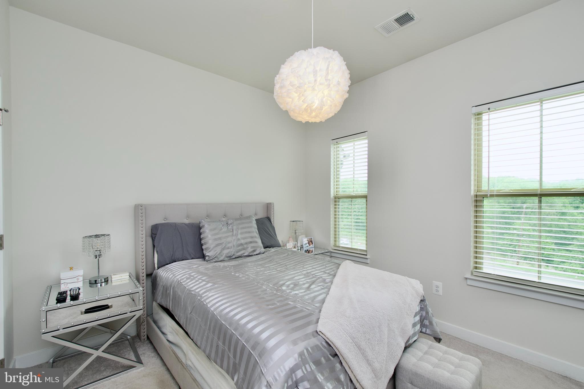 10810 Norbourne Farm Road Upper Marlboro, MD 20772 - Photo 24 of 38 a bedroom with a bed and window