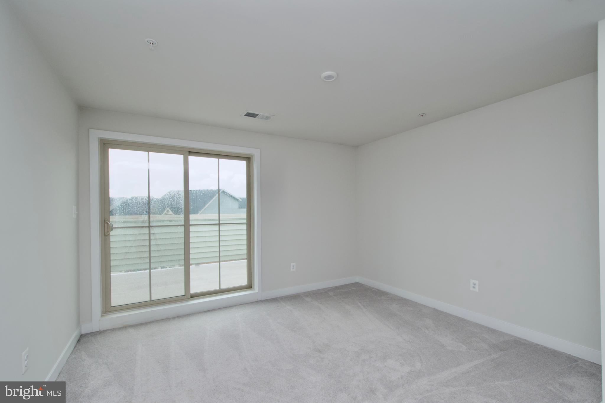 10810 Norbourne Farm Road Upper Marlboro, MD 20772 - Photo 27 of 38 an empty room with windows