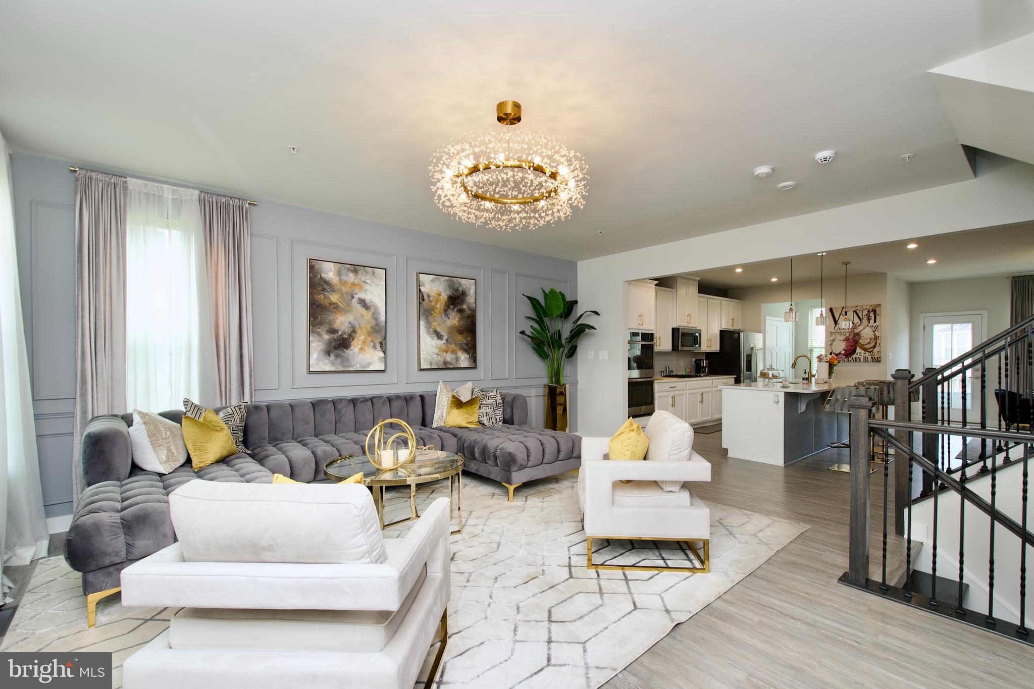 10810 Norbourne Farm Road Upper Marlboro, MD 20772 - Photo 5 of 38 a living room with furniture and a large window