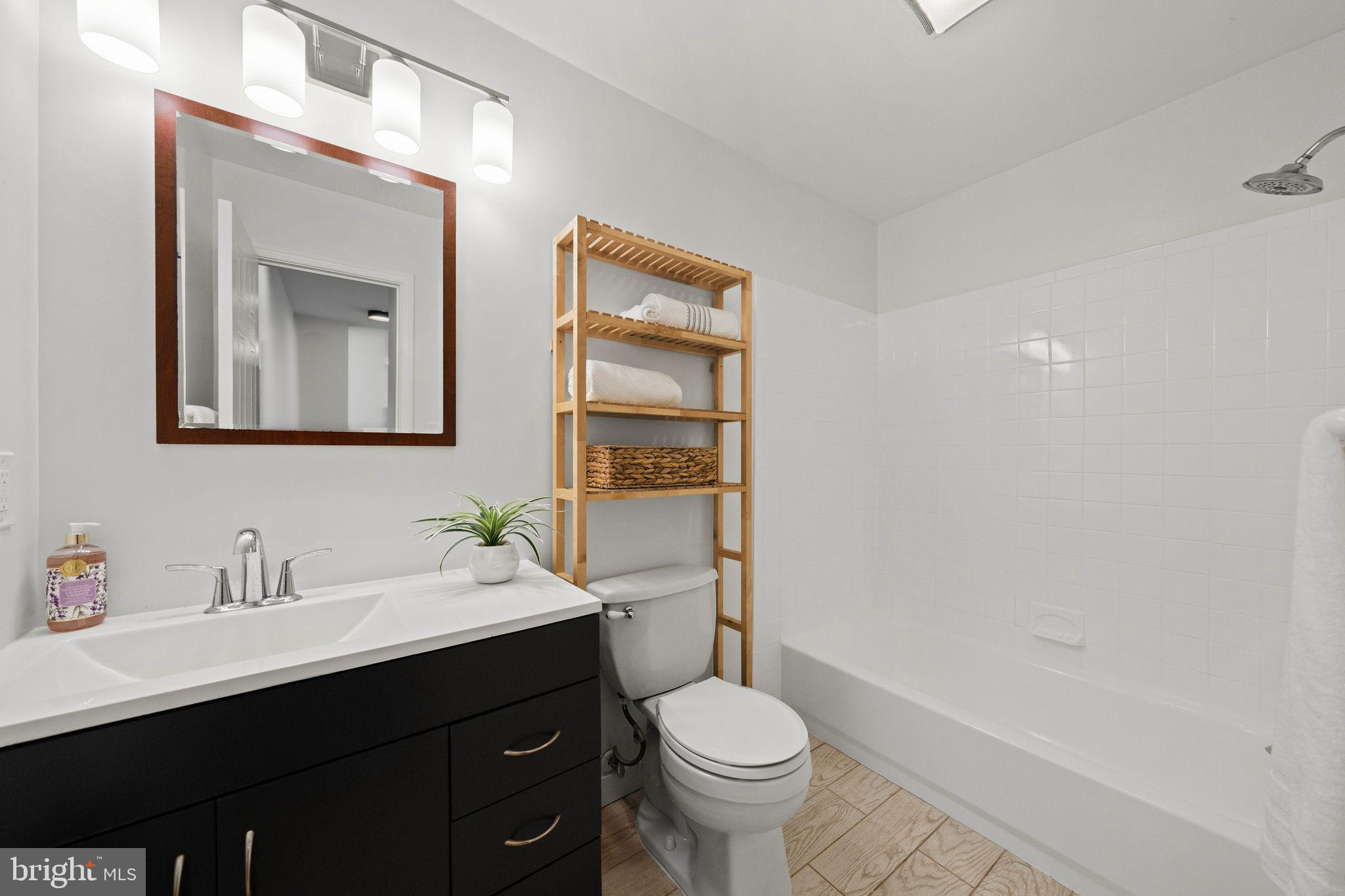 2000 16th Street Northwest, Unit 302 Washington, DC 20009 - Photo 22 of 36 Updated bathroom