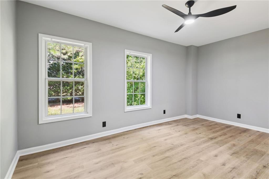 173 Freeman Forest Drive Newnan, GA 30265 - Photo 30 of 35 a view of an empty room with a window