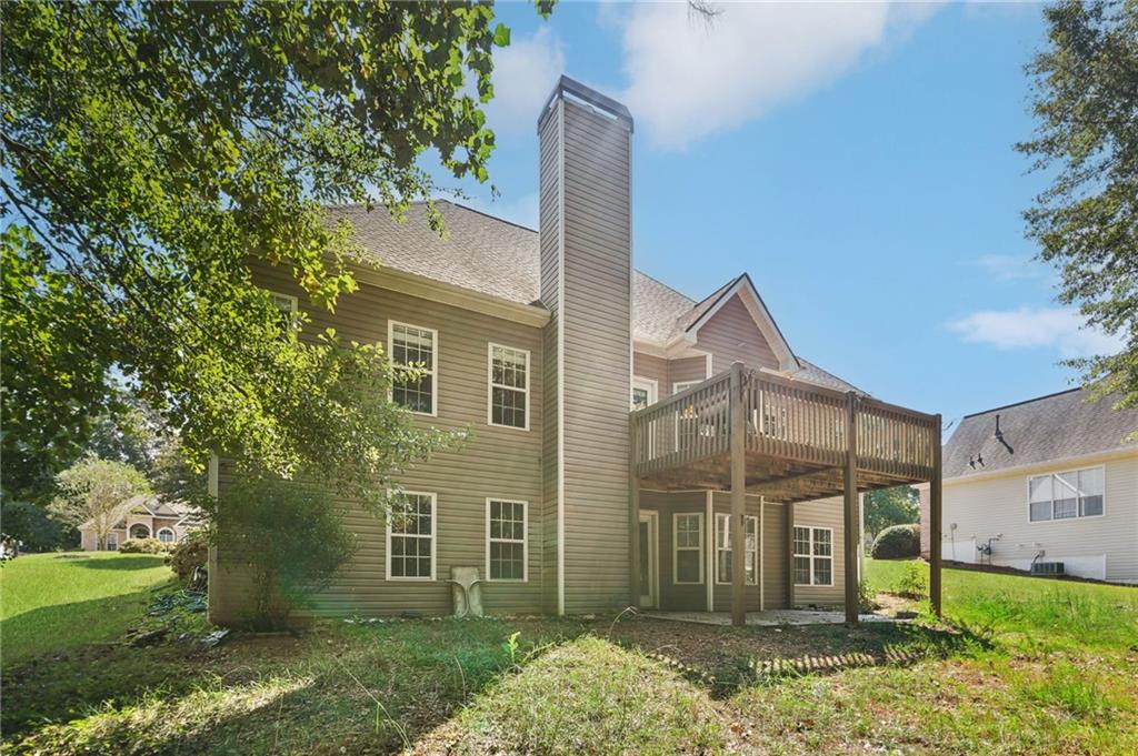 173 Freeman Forest Drive Newnan, GA 30265 - Photo 35 of 35 front view of a house with a yard