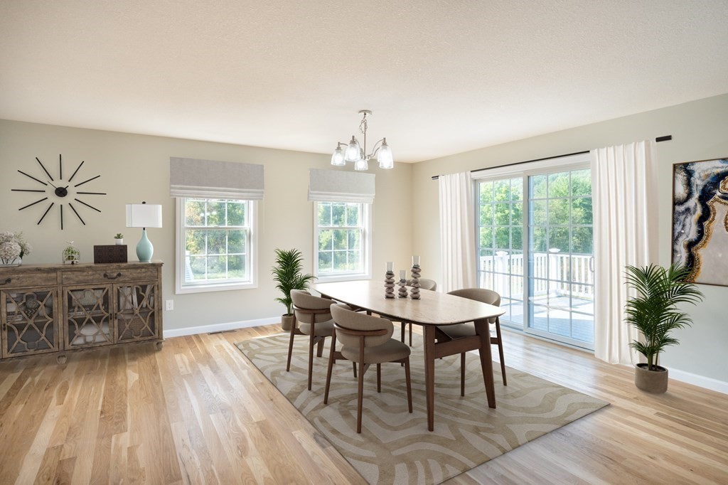 16 Upper Palmer Road Monson, MA 01057 - Photo 8 of 40 a view of a dining room with furniture window and wooden floor