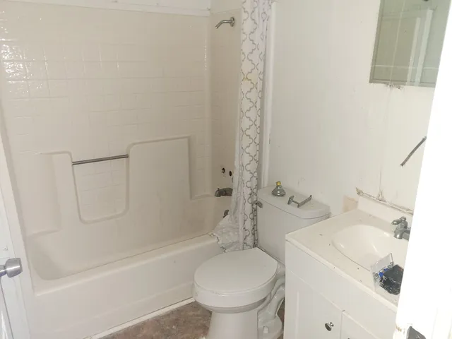 a bathroom with a sink and a toilet