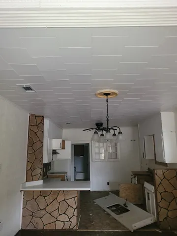 a room with cabinets and window