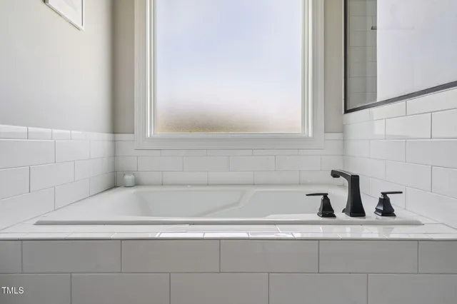 a bathroom with a bathtub