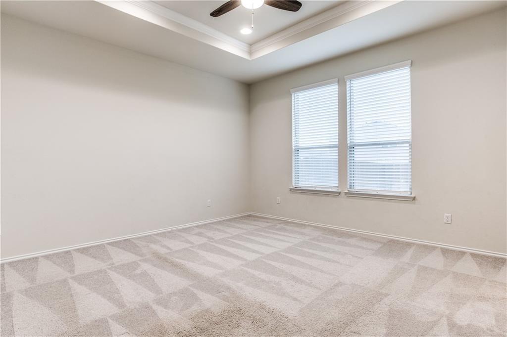 1413 Cliffbrake Way Georgetown, TX 78626 - Photo 15 of 30 an empty room with windows and ceiling fan
