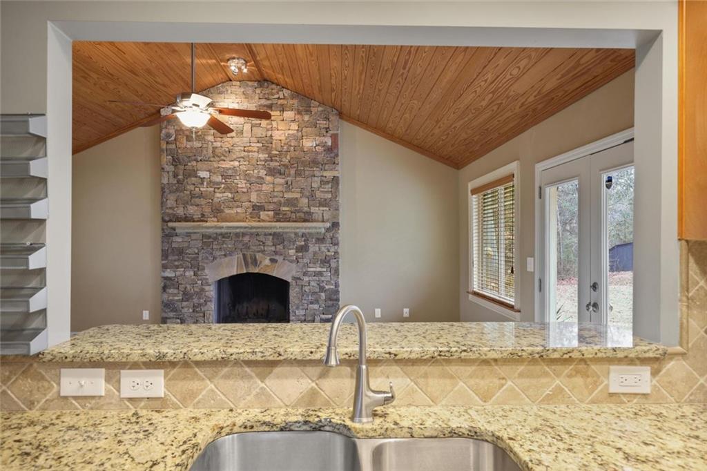 3851 Trickum Road Marietta, GA 30066 - Photo 13 of 27 a view of a livingroom with a fireplace and window
